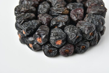 Arabic dates, ajwa dates on the white
