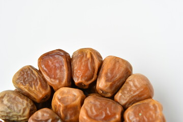 Arabic dates, sugary dates on the white
