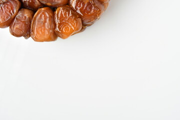 Arabic dates, sugary dates on the white

