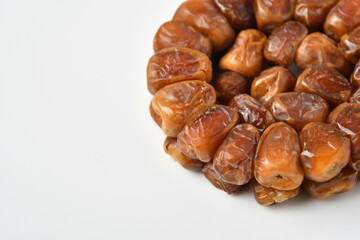 Arabic dates, sugary dates on the white
