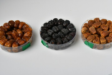 Arabic dates, sugary dates on the white
