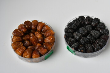 Arabic dates, sugary dates on the white
