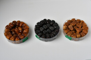 Arabic dates, sugary dates on the white
