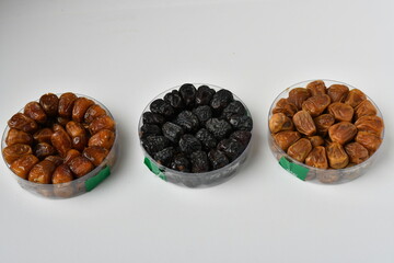 Arabic dates, sugary dates on the white
