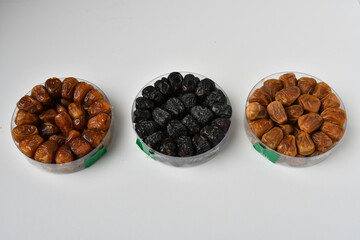 Arabic dates, sugary dates on the white
