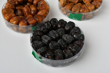 Arabic dates, sugary dates on the white
