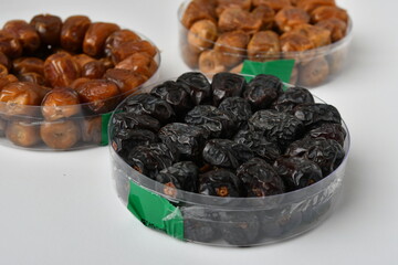 Arabic dates, sugary dates on the white
