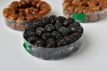 Arabic dates, sugary dates on the white
