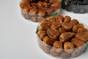 Arabic dates, sugary dates on the white

