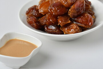 Fresh Arabian dates (Khalas dates ) isolated on white background