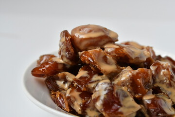 Fresh Arabian dates (Khalas dates ) isolated on white background