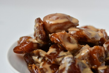 Fresh Arabian dates (Khalas dates ) isolated on white background