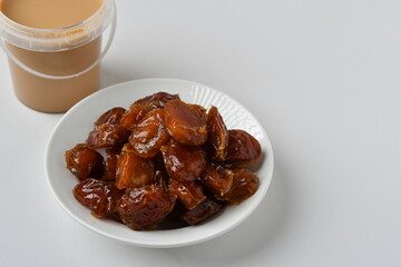Fresh Arabian dates (Khalas dates ) isolated on white background