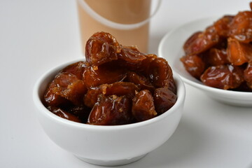 Fresh Arabian dates (Khalas dates ) isolated on white background