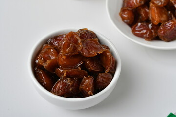 Fresh Arabian dates (Khalas dates ) isolated on white background