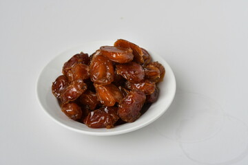 Fresh Arabian dates (Khalas dates ) isolated on white background