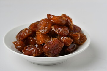 Fresh Arabian dates (Khalas dates ) isolated on white background
