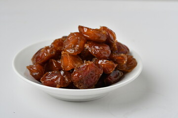 Fresh Arabian dates (Khalas dates ) isolated on white background