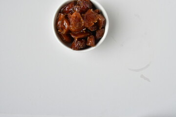 Fresh Arabian dates (Khalas dates ) isolated on white background