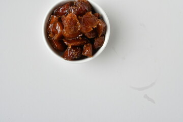 Fresh Arabian dates (Khalas dates ) isolated on white background