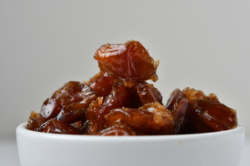 Fresh Arabian dates (Khalas dates ) isolated on white background