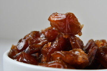 Fresh Arabian dates (Khalas dates ) isolated on white background