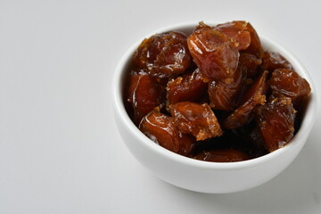 Fresh Arabian dates (Khalas dates ) isolated on white background