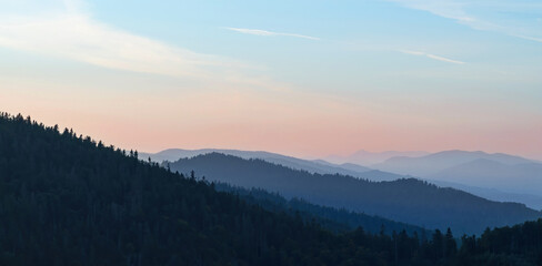 Naklejka na ściany i meble Dawn in the mountains. Amazing mountain scenery.