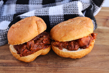 Traditional South African fried dough bread called Vetkoek, filled with chicken curry. Magwinya or Fat Cakes usually filled with mince curry or jam 