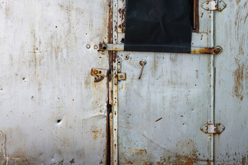 The door of the house where poor people, the homeless, the homeless live.