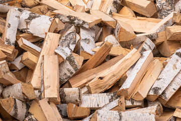 Birch firewood chopped in a pile.