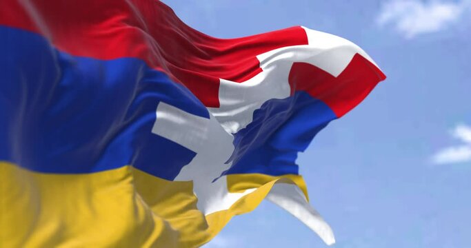Close-up view of the flag of the breakaway Republic of Artsakh waving in the wind. Selective focus. Seamless loop in slow motion
