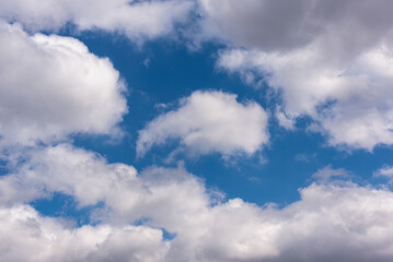 Blue sky, white clouds like in Colorado.