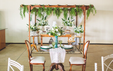 table with decoration and wedding cake