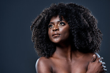 It really all starts with confidence. Studio shot of a beautiful young woman with glowing skin.