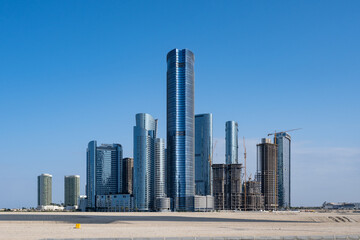 Naklejka na ściany i meble Skyline of Al-Reem Island, Abu Dhabi, United Arab Emirates