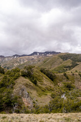 Naklejka premium Vertical view of mountain valley on a cloudy day, Chile