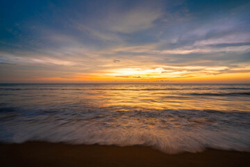 beautiful sunset and orange sky by the sea