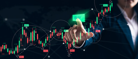 businessman hand touch graph interface Buying shares in the stock market Financial data analysis, timely acquisition, stock acquisition ideas of companies with growing businesses in the future.