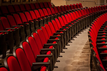 Red theater seats in rows
