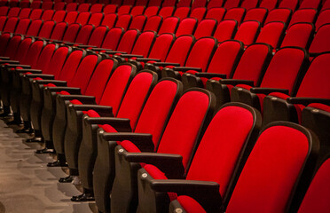 Red theater seats in rows