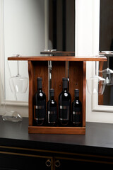 Wine bottles in wooden crate, close-up