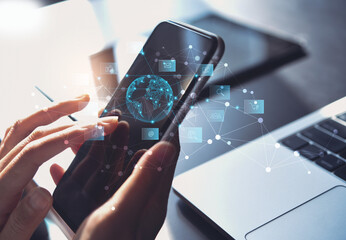 IoT Internet of Things, Global business, E-commerce, online shopping and banking concept. Woman using mobile smart phone for online shopping and internet banking, technology icons and virtual globe