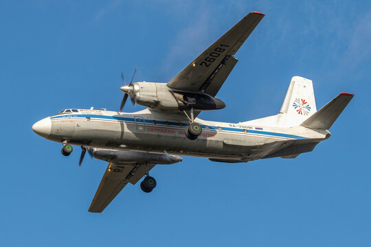 SAINT PETERSBURG, RUSSIA - OCTOBER 28, 2020: AN-26B-100 "Sharya"(RA-26081) of Kostroma Aviation Enterprise against flying against the background of a blue sky