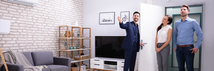 Realtor Showing New House To Customer