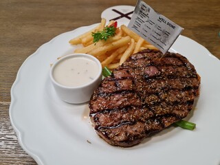 Barbecue Rib Eye Steak or rump steak - Dry Aged Wagyu Entrecote Steak. Wagyu is ready to eat with medium rare preparation