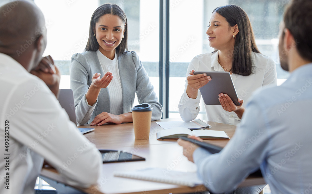 Poster do you have anything to add. shot of a group of businesspeople having a meeting in a boardroom at wo