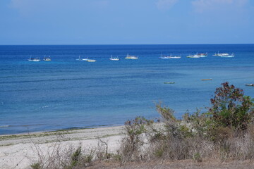 Fishing boats on quiet Katewel beaches, Southwest Sumba, NTT, Indonesia