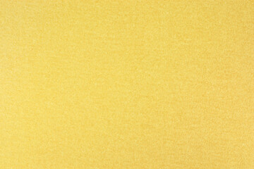 Gold texture, golden background. Shiny grunge metal wall decoration.