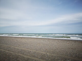 beach and waves in the mediterranean sea